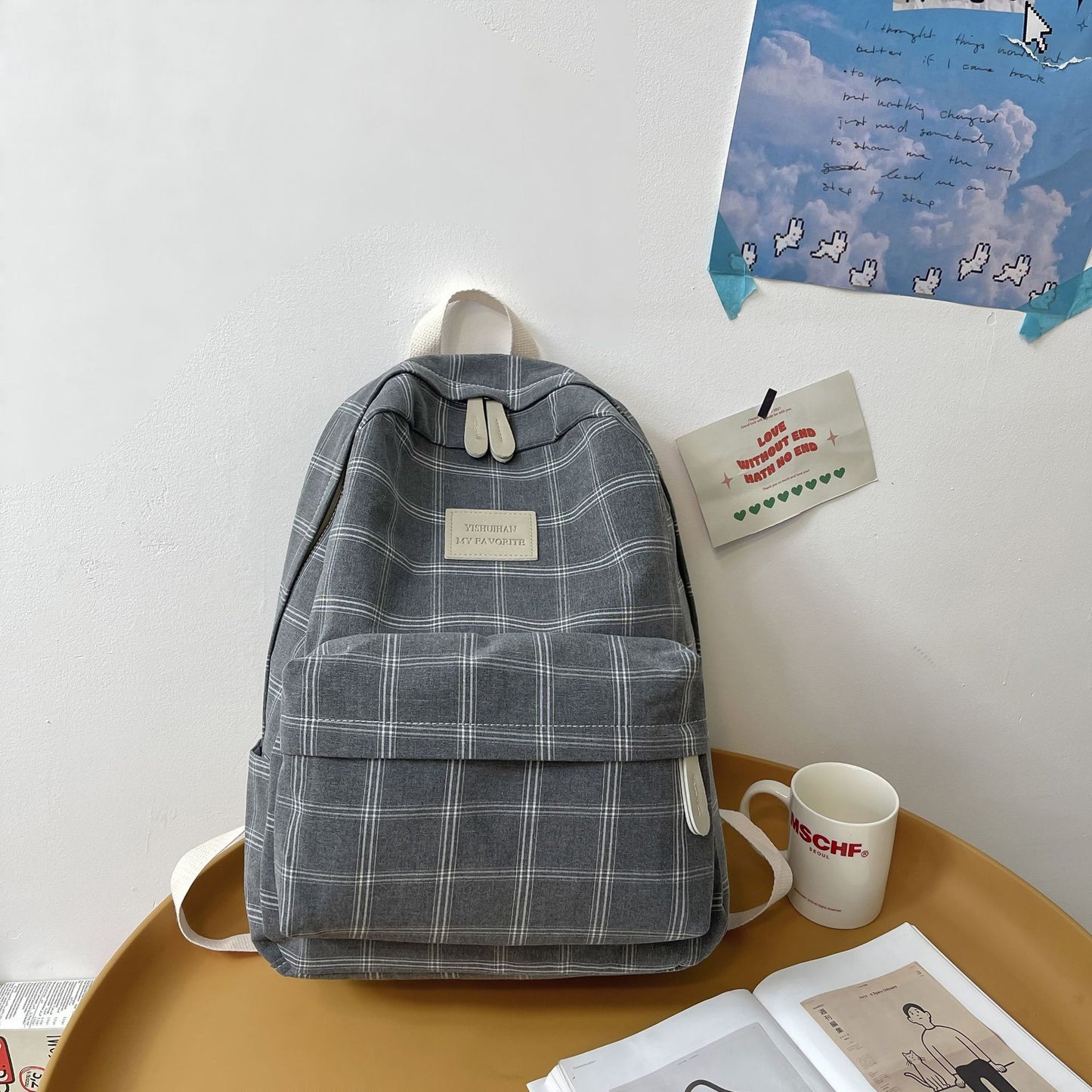 Chic Checkmate: The Plaid Perfection Backpack